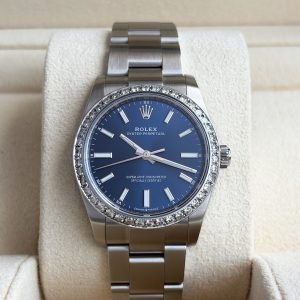 Rolex Oyster Perpetual 34 mm Blau Medium Full Set 2024 UNWORN 124200 Diamond Bezel